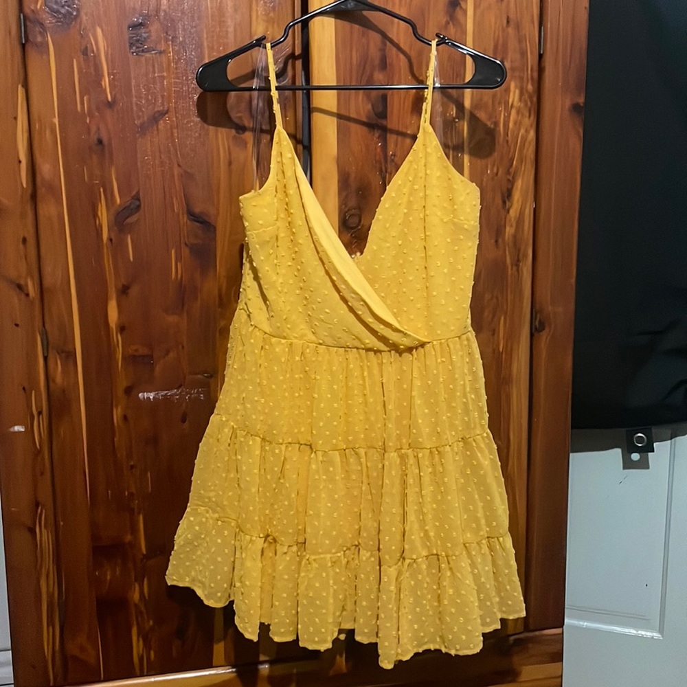 Trixxi yellow polka dot dress from Francesca’s